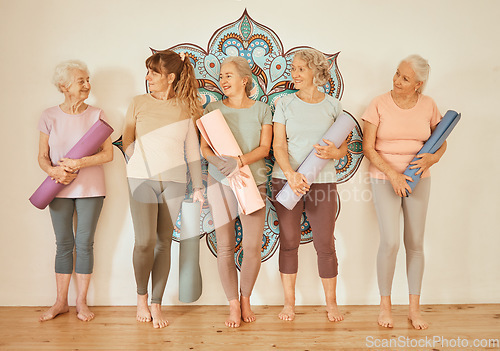 Image of Yoga class, fitness and senior women training, happy with gym pilates and meditation as a group. Wall, calm and elderly friends at studio for mindfulness, spiritual workout and relax with exercise