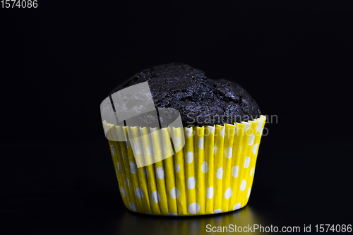 Image of unusual black cupcake close-up