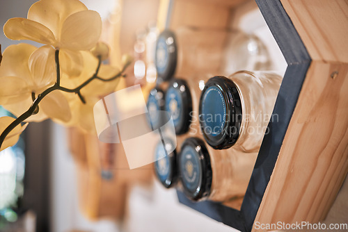 Image of Jar, honey and product in a wellness store or small business with natural, organic and raw honeycomb. Retail, food and shelves of a sustainable bee farm syrup on sale in a health and nutrition shop.