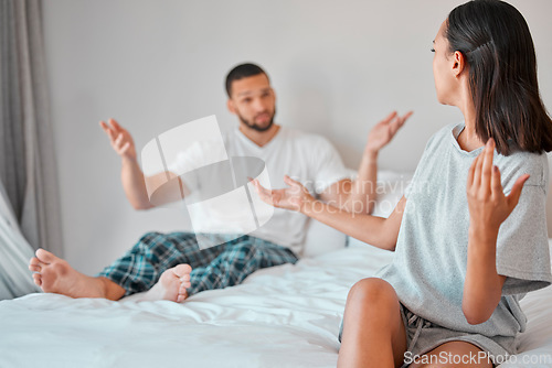 Image of Confused, conflict and fight of couple in bedroom with doubt, liar and trust problem in marriage. Frustrated, questioning and angry people on bed in discussion on cheating, divorce and decision.