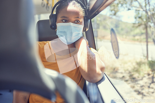 Image of Black woman, covid or headphones in bus, public transport or commute in healthcare, bacteria virus or wellness compliance. Thinking, travel passenger or student face mask and listening to radio music