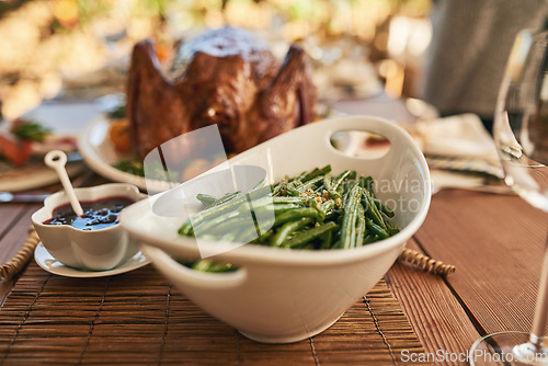 Image of Food, vegetables and nutrition with table setting for Christmas or thanksgiving celebration, dinner or lunch meal closeup. Healthy meal, green beans vegetable and dinner party to celebrate.