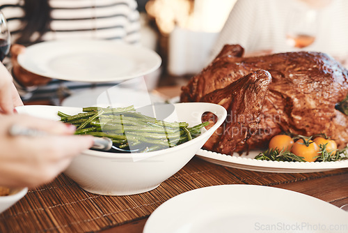 Image of Hands, thanksgiving turkey or green beans food on dining table in holiday celebration, social gathering or lunch party event. Zoom, meal or festive family, friends or people bonding at healthy buffet