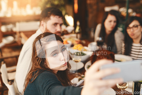 Image of Selfie, restaurant and dinner of people at party for celebration, holiday or thanksgiving and friends. Fine dining, food and influencer friends in smartphone photography for social event lifestyle