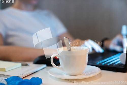 Image of Woman in quarantine for coronavirus working from home