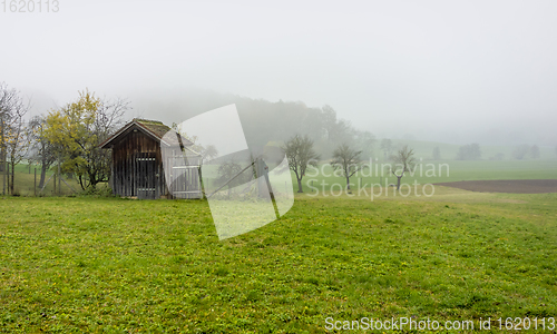 Image of rural scenery with implement shed