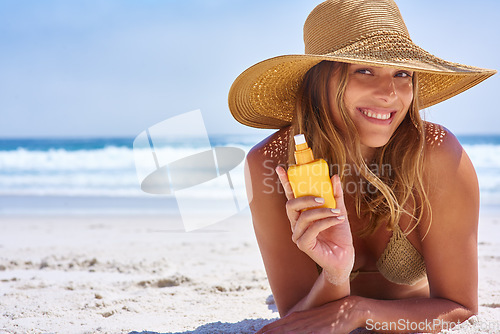 Image of Beach, sunscreen and woman relax portrait for skincare wellness on holiday vacation. Summer, bikini and skin safety product or girl on ocean sand for travel happiness, sunshine and cosmetics care
