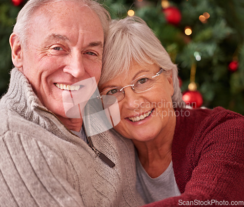Image of Senior couple, portrait and happy christmas in home, house and happiness, love and care together for winter holiday. Man, woman and old people, retirement and festive, merry xmas and celebration joy