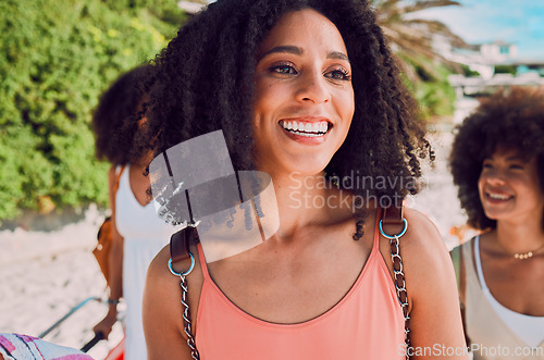 Image of Black woman, friends and walking outdoor to travel with a backpack, happiness and fun in city on their vacation in summer. Afro women together for adventure, hangout and holiday at a tourist location