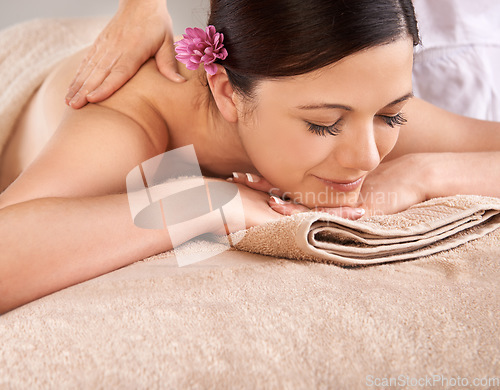 Image of Relax, wellness and massage with a woman customer in a spa for luxury, wellness or physical therapy. Peace, chakra and beauty with a female client lying on a bed in a health center for relaxation
