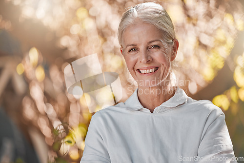 Image of Elderly woman, portrait smile and nature for happy retirement, relax or adventure in the outdoors. Happy senior female face smiling with teeth in happiness or satisfaction for the natural environment