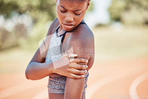 Image of Arm injury, fitness and black woman runner after training, exercise and running accident outdoor. Muscle pain, sports bruise and workout inflammation after sports on a outdoor run field of an athlete