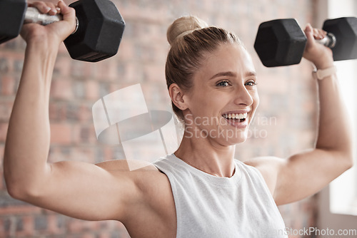 Image of Fitness, dumbbell weights and woman training for a weightlifting exercise in the gym or studio. Sports, health and strong girl doing arm workout for strength, health and wellness at a sport center.