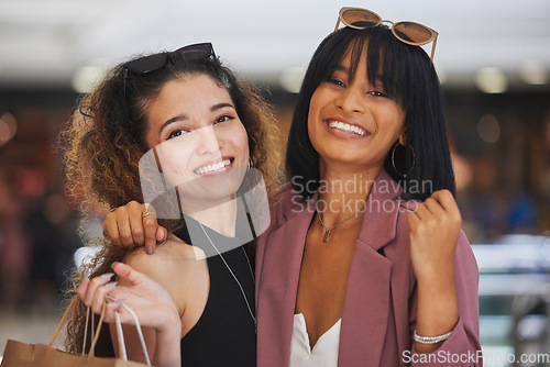 Image of Luxury retail, fashion and friends shopping for commercial goods, designer clothes and modern boutique store with shopping bag. Happy woman, friendship and women hug in Paris look for sales discount