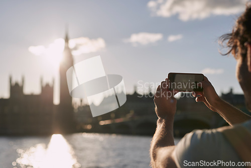Image of Man photograph Big Ben on phone in London, traveling and tourism, holiday sightseeing and famous historic landmark, buildings and vacation. Tourist, mobile pictures and clock tower in England city