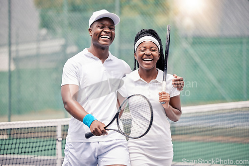 Image of Friends, tennis and happy smile, fitness and racket after sport training, workout and practice at outdoor. Black man, woman and athlete couple, happiness and sports practice on tennis court together