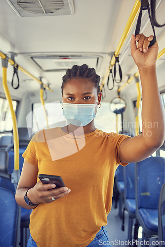 Image of Bus, public transport and black woman with phone and covid face mask during travel for safety compliance and health. Portrait of female during covid 19 with smartphone for communication and schedule