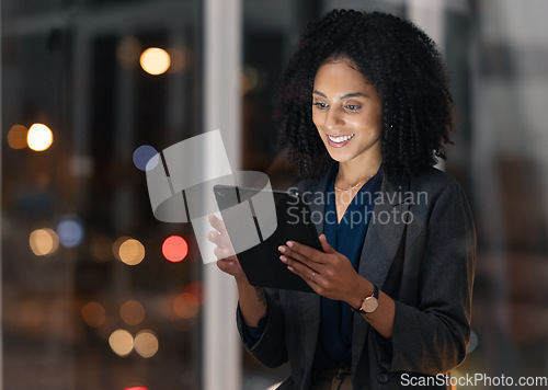 Image of Night business, black woman and tablet for communication, marketing and data analytics online with smile for success, achievement and benchmarking results. Entrepreneur with technology for innovation