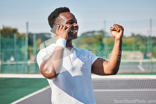 Image of Black man, tennis and phone call in celebration for win, victory or achievement for winning tournament. Happy African American tennis player male winner with smile celebrating in phone conversation