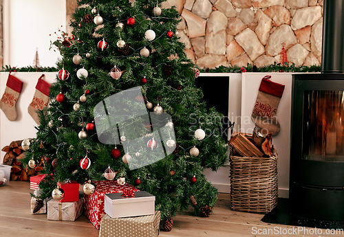 Image of Christmas tree, present and holiday living room in winter with house decoration and gifts. Home gift giving and celebrating tradition with trees in the morning ready for a festive party in household