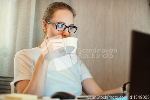 Image of Woman in quarantine for coronavirus working from home