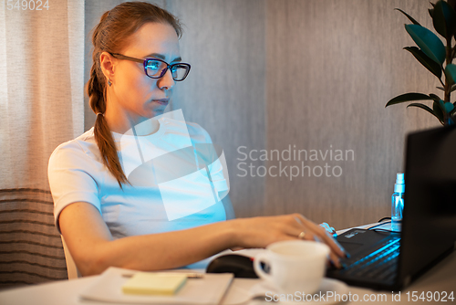 Image of Woman in quarantine for coronavirus working from home