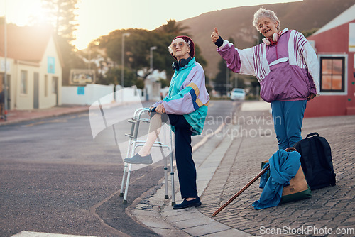 Image of Hitchhiking, disability and travel with senior friends standing on a corner looking for a trip with a hand sign or gesture. Transport, road and handicap with a mature woman and friend hitching a ride