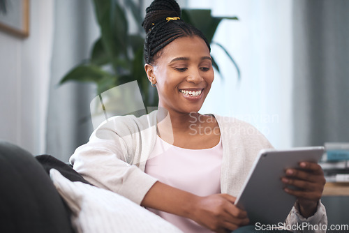 Image of Black woman, happiness and tablet on sofa for communication, social media and online shopping or banking with home wifi connection. Female with technology for streaming, mobile app and social life