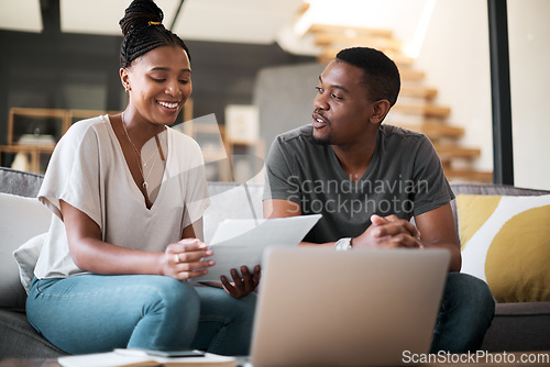 Image of Laptop, finance and budget with a black couple working on debt or accounting or banking in their home living room. Computer, documents and investment with a man and woman financial planning online