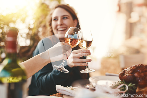 Image of Wine, glasses and toast people at restaurant for thanksgiving, holiday celebration and fine dining lifestyle in winery or hospitality. Champagne, alcohol and woman celebrate, cheers and social event