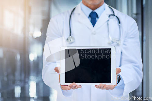 Image of Tablet, screen and mockup with doctor in hospital for advertising, marketing or product placement. Medical professional, tech and digital touchscreen for telehealth, online consultation or research.