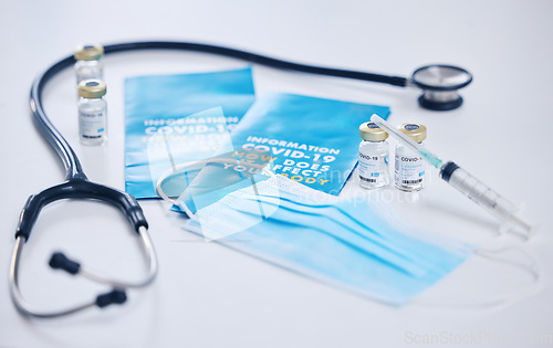 Image of Covid, face mask with vaccine and syringe, stethoscope and healthcare with medical and medicine. Covid 19 information flyer, health and safety with glass bottle and liquid for corona and health care.