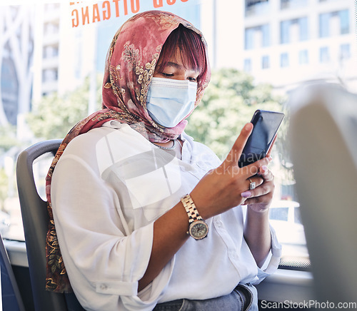 Image of Covid, muslim and bus woman on a phone with face mask reading corona virus update, compliance news and social media report. Corona virus, transport and travel black woman smartphone for safety rules