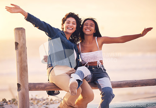 Image of Beach, sunset and portrait of girl friends on outdoor adventure for bonding, peace and sea freedom. Happy, smile and nature women on summer vacation, travel journey or holiday to Miami Florida ocean