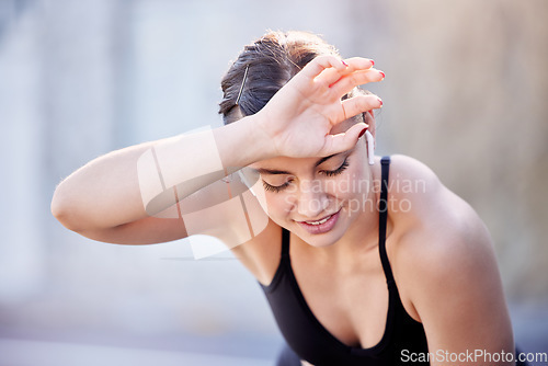 Image of Fitness music, sweat and woman tired after outdoor running, cardio workout or marathon race training. Radio podcast, wellness and exhausted athlete runner with fatigue after sports performance action