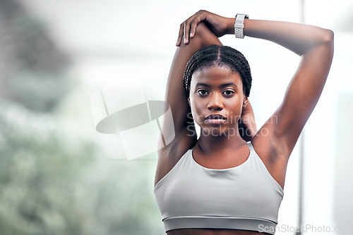 Image of Black woman, arm or stretching in fitness, workout or training in muscle recovery, pain relief or healthcare wellness. Portrait, runner or sports athlete in warm up exercise or marathon running goals