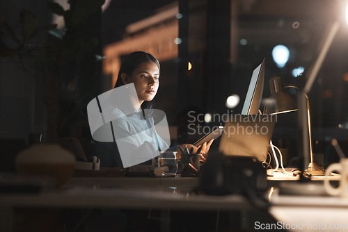 Image of Business woman, in office at night and use tablet with computer planning, thinking and working on digital strategy for financial company. New york, corporate employee and fintech banking security