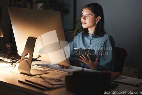 Image of Night office, computer and business woman with tablet for digital marketing, seo analytics and multimedia application review. Website design, graphic designer and creative employee in dark workspace