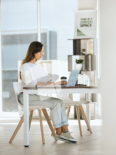 Image of Woman, working and laptop at digital marketing company, eco startup and work with technology at desk. Green business, seo content writing and online research for blog post or social media advertising