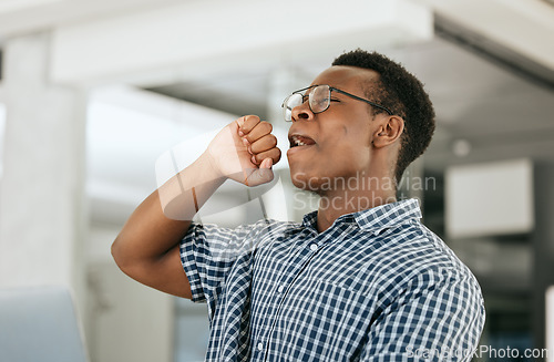 Image of Tired, yawn and business black man on laptop in office workplace for startup management, company report and market research. Fatigue, burnout and mental health risk of corporate employee at his desk