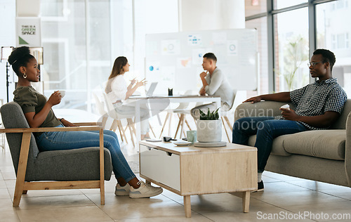 Image of Business people, interview and recruitment with hr, waiting and talking in office for job seeker and employment company. Black man and woman talking in office while waiting for hiring manager at work