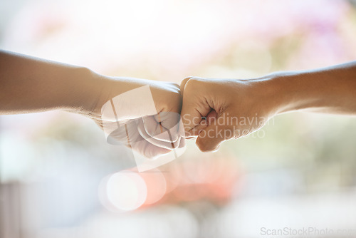 Image of Teamwork, fist bump and motivation, collaboration and success for goals, trust and support. Closeup friends, greeting hands and team building, commitment and winner, solidarity and fighting racism