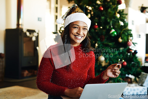 Image of Portrait, Christmas and woman with laptop use credit card for transaction, cheerful or ecommerce for festive season. Xmas, young female and device for payment, online banking, happy with the internet