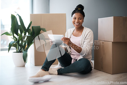 Image of Woman, moving and tablet of black person with new home and real estate property happy. Portrait of house box with female on web, internet and online ecommerce online shopping for furniture with wifi