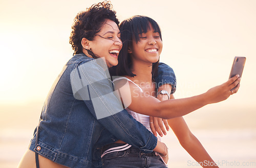 Image of Beach, summer and friends taking selfie with phone enjoying holiday, vacation and weekend together. Freedom, travel and women happy, relax and bonding to take photo with smartphone for social media