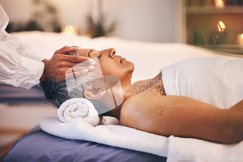 Image of Hands, old woman and head massage at spa for wellness, relax and stress relief. Luxury, zen and peace with elderly female on table with masseuse for physical therapy, skincare or facial treatment.