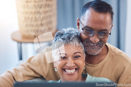 Image of Senior couple, happy and laptop while online streaming movie, show or comic video and laughing at meme using home wifi on social media. Face of man and woman in lounge to search internet for fun