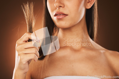 Image of Hair problem, fail and woman stress with damaged hair, split ends or bad haircut. Trichology crisis, hair disaster and model unhappy with hair loss or damage from shampoo routine on studio background