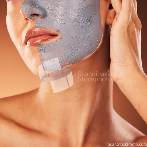 Image of Facial mask, skincare and beauty of a woman face doing self care, health and wellness for skin. Face cleaning, dermatology and relax cosmetic cream of a model doing luxury clay product treatment