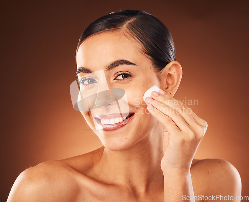 Image of Beauty portrait, skincare and cotton pad of a woman cleaning face for healthy skin glow and wellness. Cosmetics, facial wash and self care of a model doing dermatology, body care and morning routine